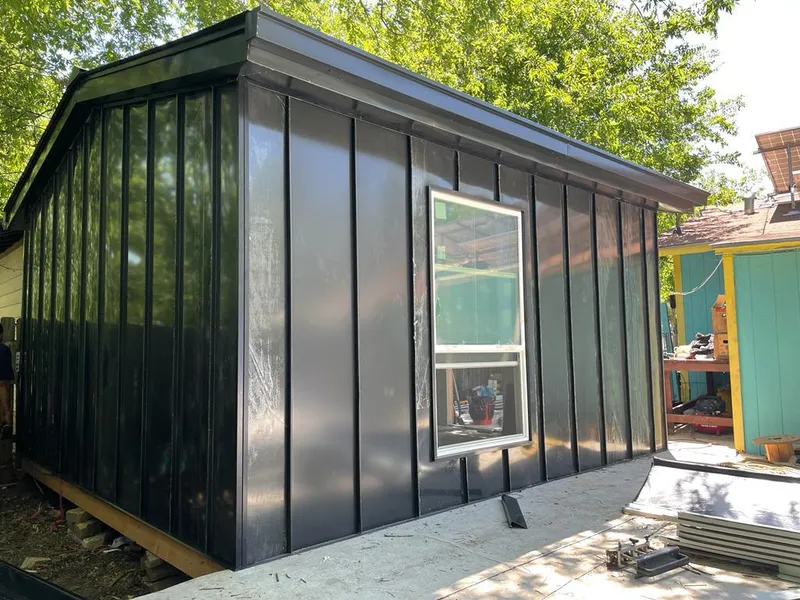 Black standing seam metal wall panels for Roof Inspection in Oceano