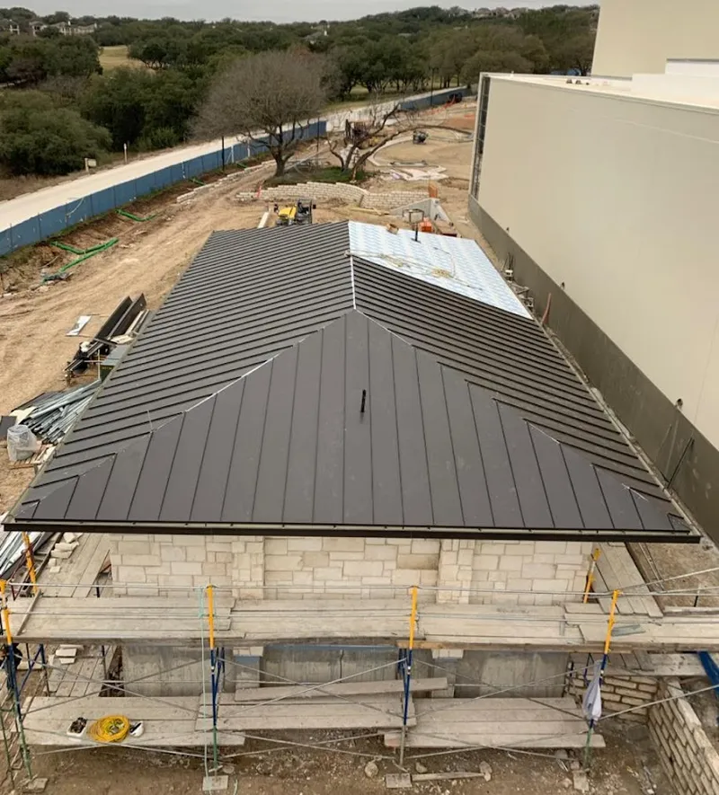 Metal roof new construction with scaffolding in Oceano
